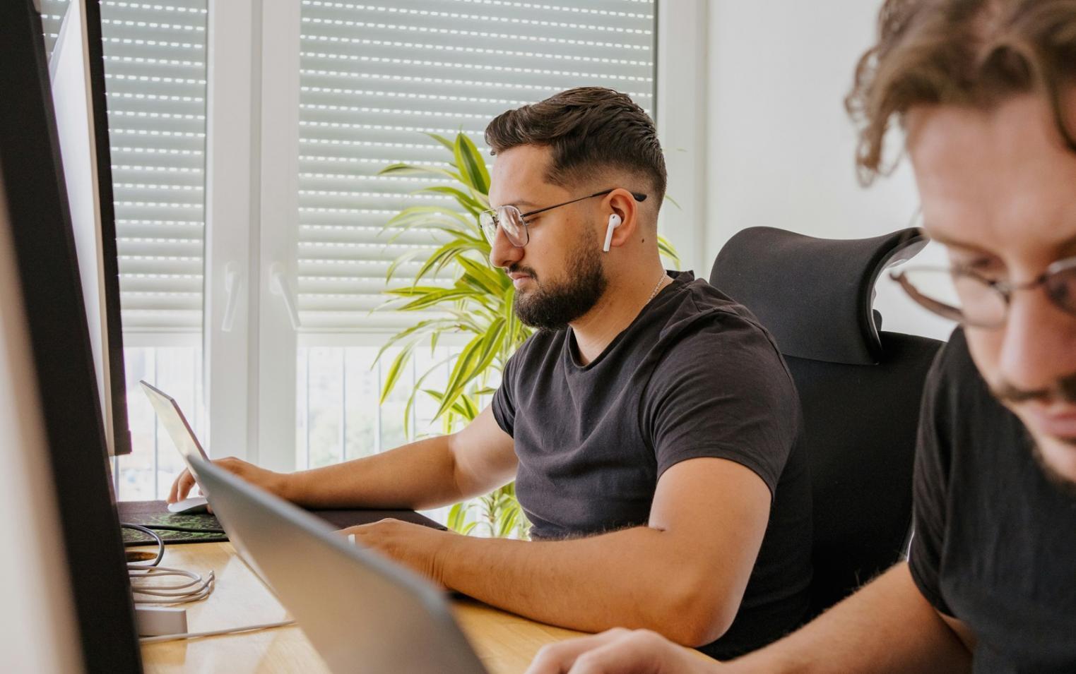 Professional workspace showing financial analysis and budget review process